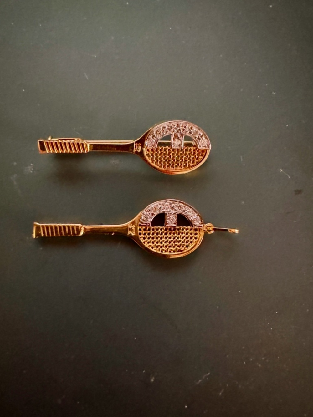 Vintage diamond/gold tennis rackets